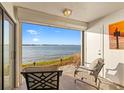 Relaxing waterfront patio with comfortable seating at 6265 Sun Blvd # 101, St Petersburg, FL 33715