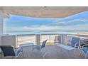 Stunning balcony view of the ocean and beach at 1350 Gulf Blvd # 604, Clearwater, FL 33767
