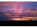 Dramatic sunset with sun rays breaking through the clouds at 1365 Snell Isle Ne Blvd # 6A, St Petersburg, FL 33704