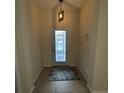 Bright and airy entryway with tile flooring at 1707 Magnolia Landings Ct, Sun City Center, FL 33573