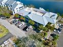 Beautiful condo aerial view with lots of parking and luscious palm trees at 611 Destiny Dr # 410, Ruskin, FL 33570