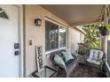 Cozy front porch with wicker furniture and welcoming decor at 7014 Ivanhoe Dr, Port Richey, FL 34668