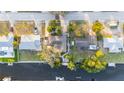 Aerial view of the property showcasing the home's layout, landscaping, and water access at 9665 2Nd N St, St Petersburg, FL 33702