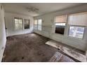 Spacious living room featuring hardwood floors and a fireplace at 1311 11Th S Ave, St Petersburg, FL 33705