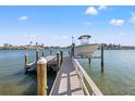 Private boat dock with lift and beautiful water views at 17077 Dolphin Dr, North Redington Beach, FL 33708