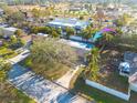 Aerial view showing the home's private pool and backyard at 2215 Cedar Dr, Dunedin, FL 34698