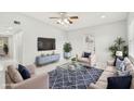 Spacious living room with comfortable seating and a large TV at 2503 W Crawford St, Tampa, FL 33614