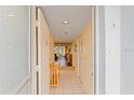 Bright condo entryway with view to living room at 3780 Pinebrook Cir # 106, Bradenton, FL 34209