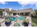 Inviting pool area with spacious patio and lush tropical landscaping at 5801 Leeland S St, St Petersburg, FL 33715