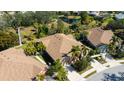 Bird's-eye view of houses with brown roofs and palm trees at 7402 Hamilton Rd, Bradenton, FL 34209