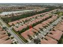 Aerial view showcasing the villa's location in a residential community at 314 Bluewater Falls Ct, Apollo Beach, FL 33572