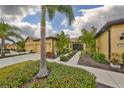 Villa with double garage and nicely landscaped front yard at 314 Bluewater Falls Ct, Apollo Beach, FL 33572