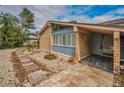 House entrance with stone walkway and landscaping at 3201 Belmore Rd, Tampa, FL 33618