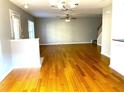 Hardwood floor living room with a view of the staircase at 3863 Island Way, St Petersburg, FL 33705