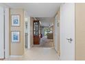 Bright entryway with tiled floors and views into the living room at 6085 Bahia Del Mar Blvd # 105, St Petersburg, FL 33715