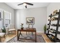 Spacious home office with hardwood floors and built-in shelving at 6210 Nikki Ln, Odessa, FL 33556