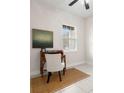 Small home office with desk, chair, and area rug at 7602 S Desoto St, Tampa, FL 33616