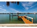 Expansive wooden dock offering ample space for boat mooring at 9320 Gulf Blvd, St Pete Beach, FL 33706