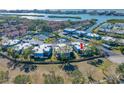 Aerial view of community showing location of condo near water at 14525 Catalina Cir, Seminole, FL 33776