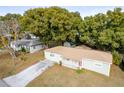 Aerial view showing a house and surrounding neighborhood at 27103 Wakefield Dr, Brooksville, FL 34602