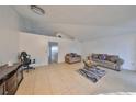 Spacious living room with tile flooring and neutral color palette at 305 Crayford Pl, Valrico, FL 33594