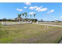 House with white fence and long driveway at 3571 Recurve Cir, Sarasota, FL 34240