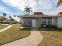 Neat and charming mid-century home with a small patio at 4316 Tahitian Gardens Cir # H, Holiday, FL 34691