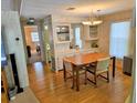 Small dining area with wood table and chairs at 12501 Ulmerton Rd # 188, Largo, FL 33774