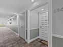 Building hallway with carpet flooring and neutral wall colors at 134 Mariner Dr # 134, Tarpon Springs, FL 34689