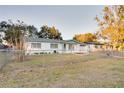 Ranch style home with a large backyard and mature trees at 1806 E Alabama St, Plant City, FL 33563