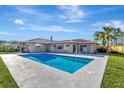 Inviting swimming pool with a large patio area at 2851 Hardee Dr, Sarasota, FL 34231