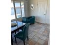 Waterfront dining area featuring a table and comfortable chairs at 1819 Shore S Dr # 315, South Pasadena, FL 33707
