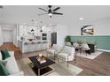 Open concept kitchen with island and white cabinets at 5658 Del Coronado Dr, Apollo Beach, FL 33572
