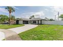 Updated home showcasing a fresh exterior and landscaping at 734 Fortuna Dr, Brandon, FL 33511