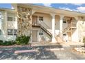 Two-story building with stone accents and individual entrances at 2700 Magdalina Dr # 2B, Punta Gorda, FL 33950