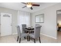 Bright dining area with a four-person table and gray chairs at 3046 35Th N Ave, St Petersburg, FL 33713