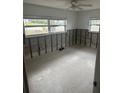 Needs renovation, features concrete floors and window views at 3553 Center Cir, Largo, FL 33774