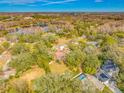 Wide angle aerial view showing home and surrounding landscape at 3704 Berger Rd, Lutz, FL 33548
