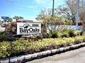 Bay Oaks community entrance sign with landscaping at 5265 E Bay Dr # 410, Clearwater, FL 33764
