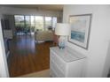 Bright living room with hardwood floors and access to a balcony at 6315 Shoreline Dr # 3208, St Petersburg, FL 33708