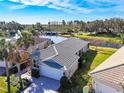 Property showcasing a bird's-eye view of the house and surrounding landscape at 15856 Cobble Mill Dr, Wimauma, FL 33598