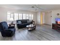 Spacious living room featuring a neutral color palette and modern flooring at 18719 Van Nuys Cir, Port Charlotte, FL 33948