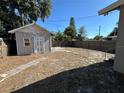 Small backyard with shed and walkway at 2126 43Rd N Ave, St Petersburg, FL 33714