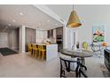 Modern kitchen with island and breakfast bar at 301 1St S St # 1404, St Petersburg, FL 33701