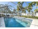 Relaxing swimming pool with screened enclosure at 5720 Venetian Ne Blvd, St Petersburg, FL 33703