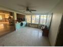 Under renovation dining room with exposed walls and flooring at 1019 Mandalay Ave, Clearwater Beach, FL 33767