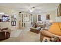 Bright living room featuring two sofas and a coffee table at 12433 Shadow Ridge Blvd, Hudson, FL 34669