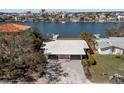 Bird's-eye view of single-story home, showcasing its waterfront location at 17020 Dolphin Dr, North Redington Beach, FL 33708