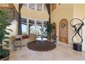 Spacious living room with large windows and high ceilings at 288 Mobbly Bay Dr, Oldsmar, FL 34677