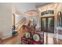 Elegant foyer with a chandelier and staircase at 2987 Wentworth Way, Tarpon Springs, FL 34688